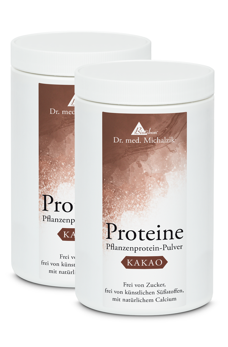 Poudre de protéine végétale cacao – 500 g Deux conteneurs blancs de poudre de protéine végétale cacao, 500 g, sur fond blanc.