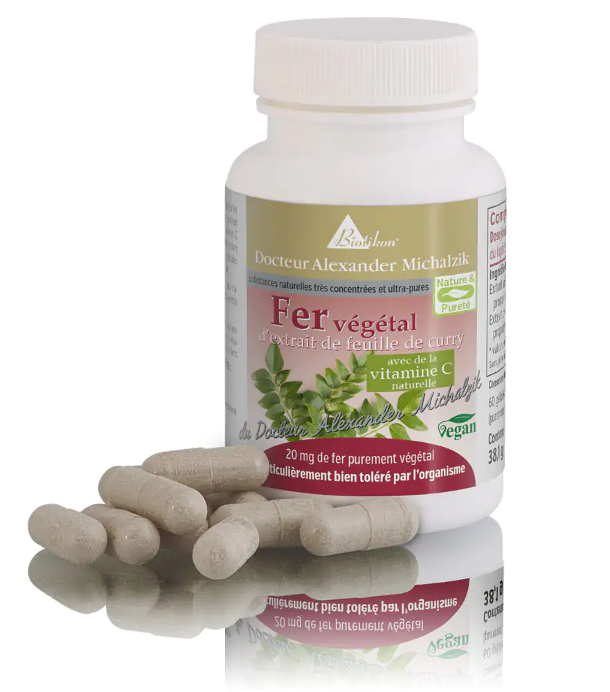 Fer Végétal 20 mg – Capsules Capsules de fer végétal de 20 mg, à base d'extrait de feuilles de curry, beige, dans un flacon blanc.