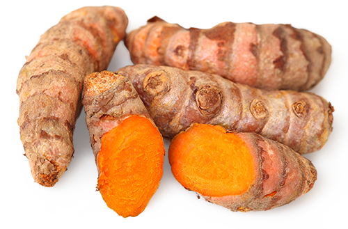 Racine de Curcuma – 500 g Racines de curcuma fraîches, tranches orange, sur fond blanc.
