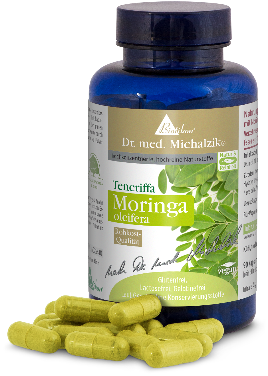 Moringa Oleifera – 90 Capsules Flacon contenant des capsules de Moringa Oleifera, capsules vertes, 90 pièces, végan, dans un flacon bleu.