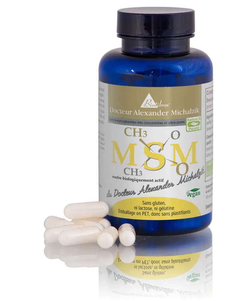 Gélules MSM 500 mg - Végétalien Bouteille bleue avec des gélules blanches, 500 mg MSM, végétalien, transparent, vue rapprochée.