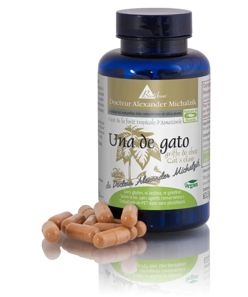Una de Gato – Capsules Capsules brunes dans un contenant transparent, 63,5 g, avec un design tropical.